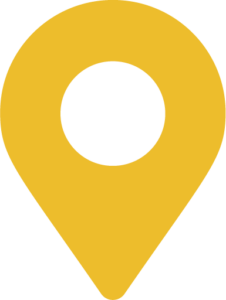 a yellow map marker with a white circle